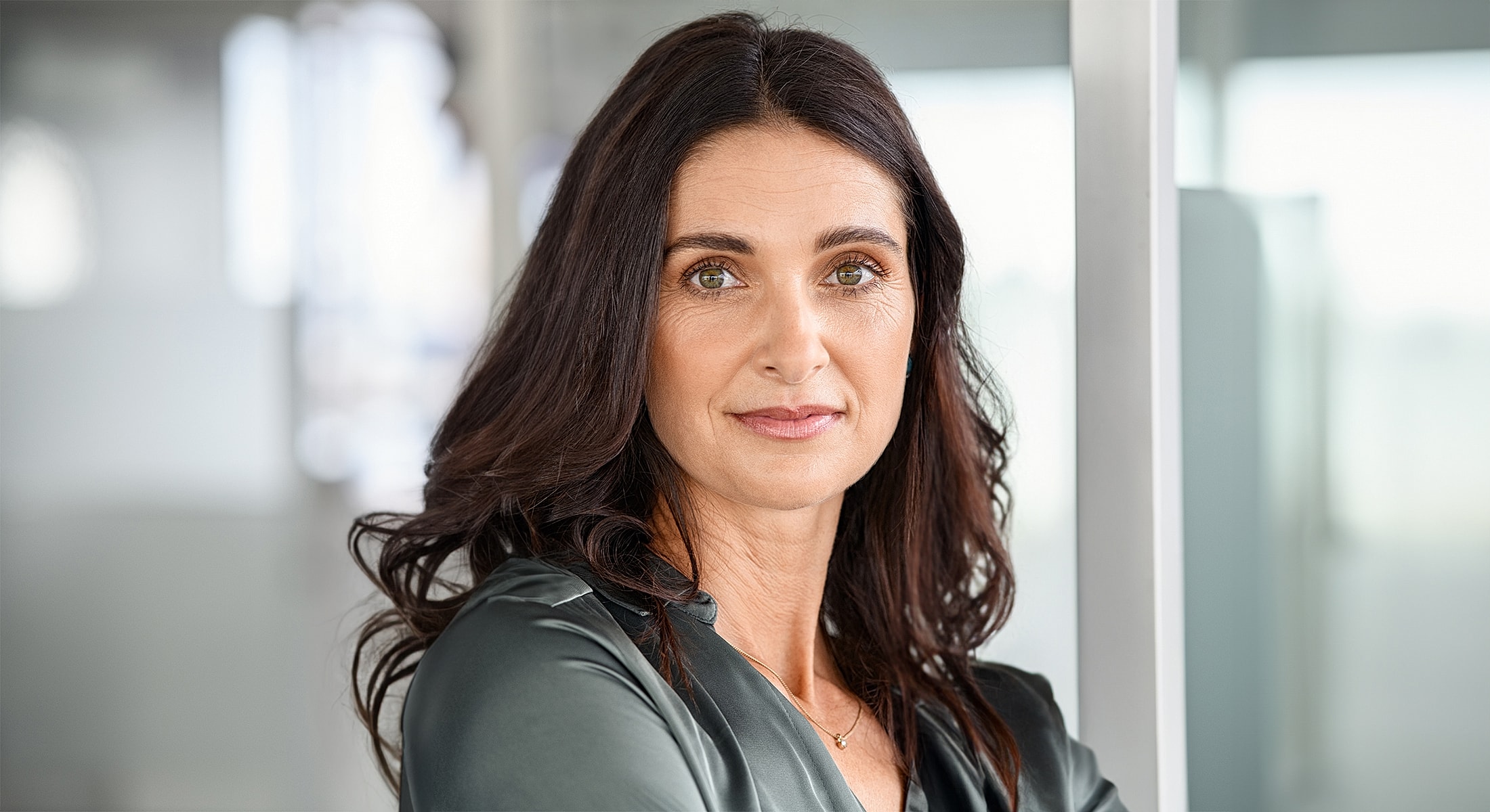 Portrait of a woman with long dark hair